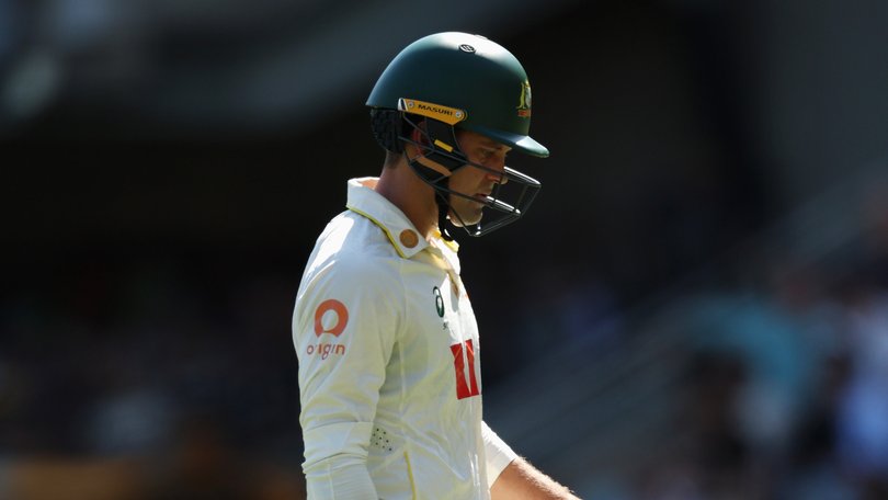 Alex Carey of Australia leaves the field after being dismissed.