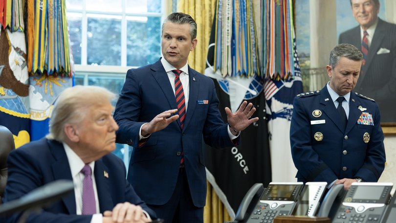 President Trump, Defense Secretary Pete Hegseth and Gen. Dan Caine in the Oval Office in September.