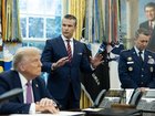 President Trump, Defense Secretary Pete Hegseth and Gen. Dan Caine in the Oval Office in September. 