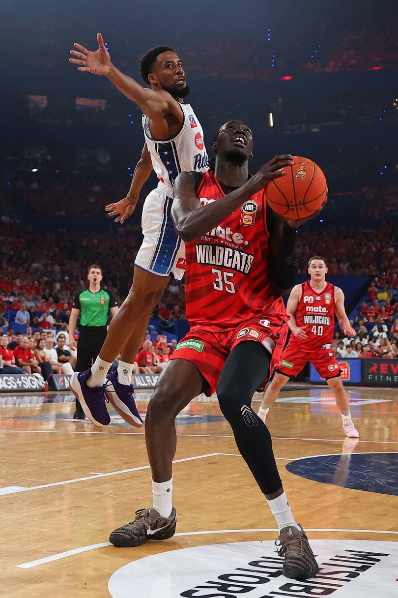 Cotton attempting to block Wildcat David Okwera once the action started.