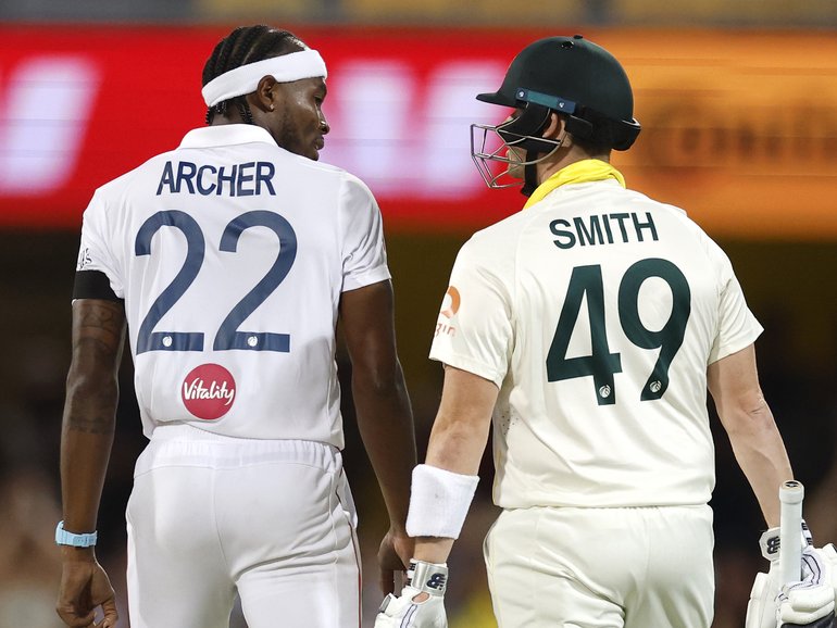 Jofra Archer and Steve Smith exchange words.