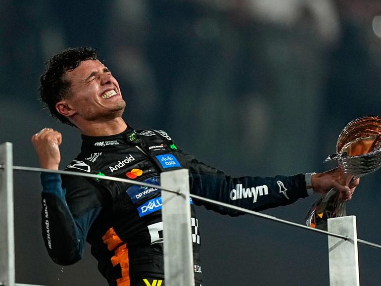 McLaren's Lando Norris could hardly believe he had become F1 world champion in Abu Dhabi. (AP PHOTO)