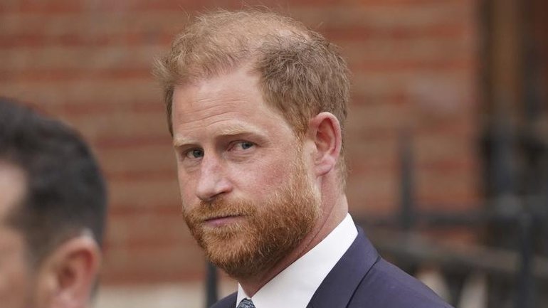 During Prince Harry's last UK visit in September, a "known stalker" came "within feet" of him. (AP PHOTO)
