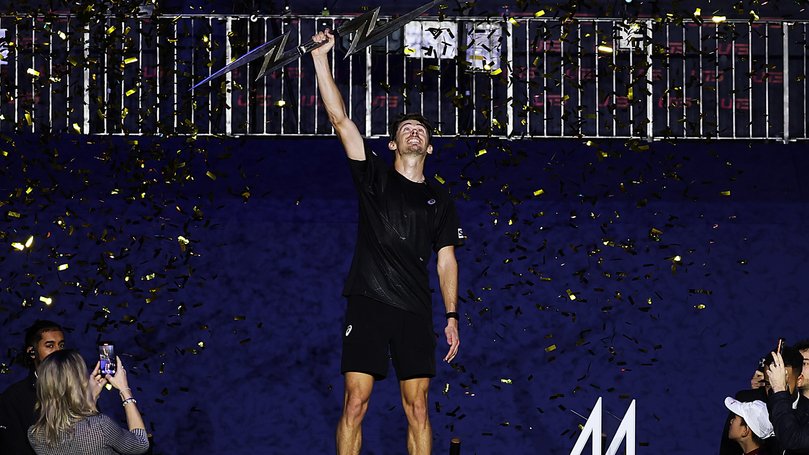 Alex de Minaur of Australia celebrates with the trophy after winning the final against Casper Ruud of Norway during the UTS London Grand Final 2025.