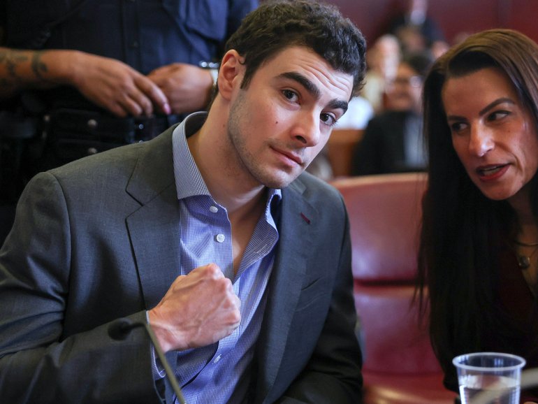 Luigi Mangione appears in Manhattan Criminal Court for an evidence hearing on Monday, December 8, 2025.