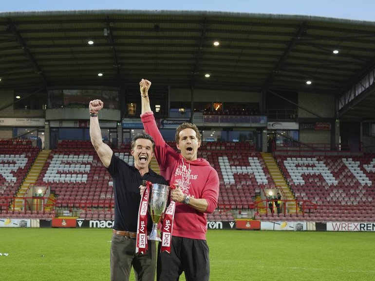 Rob McElhenney and Ryan Reynolds bought Wrexham in 2021 and have overseen its fairytale success. (AP PHOTO)