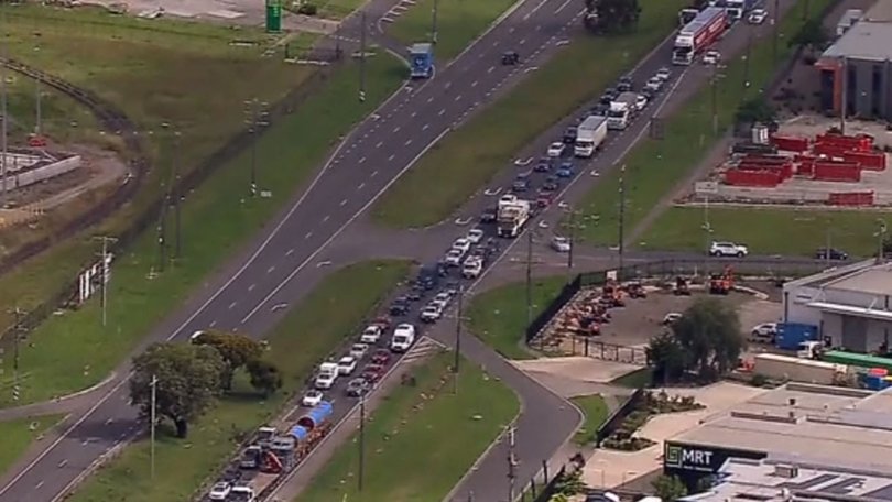 Traffic chaos has been caused by the crash, with motorists are urged to avoid the area and use the Hume Fwy from Craigieburn.