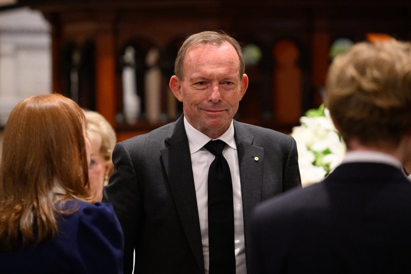 Former prime minister Tony Abbott attends the state funeral for Graham Richardson at St James Church.