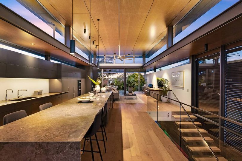 The top level open-plan kitchen, dining and living.