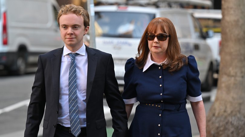 Graham Richardson’s wife Amanda and son Darcy arrive for the funeral.