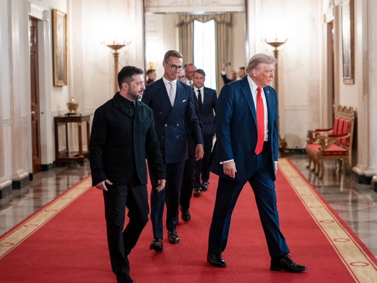 FILE — President Donald Trump walks with President Volodymyr Zelenskyy of Ukraine at the White House in Washington, on Monday, Aug. 18, 2025. Trump said in an interview published on Dec. 9 that Europe was weak and its nations were Òdecaying,Ó days after his administration issued a strategy paper that indicated that the United States should no longer guarantee the continentÕs security. (Doug Mills/The New York Times)