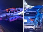A light plane has crashed onto a car on a busy highway.