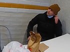 Luigi Mangione, a suspect in the fatal shooting of UnitedHealthcare CEO Brian Thompson, is confronted by police at a McDonald's.