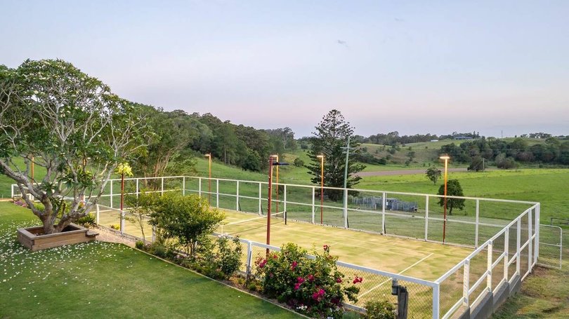Across the expansive grounds are a mini golf course and a full-size tennis court.
