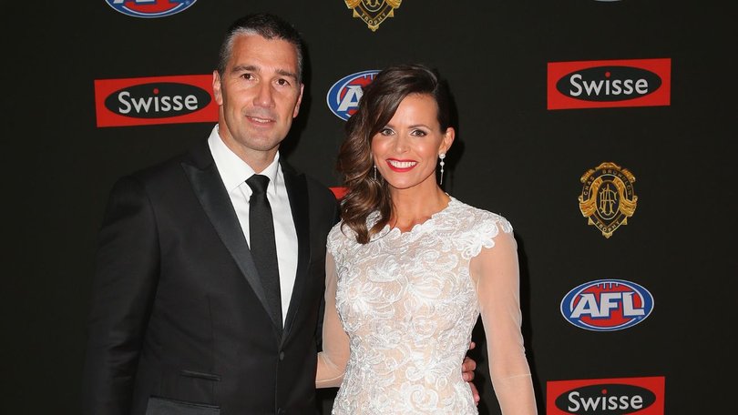 AFL great Stephen Silvagni with his famous wife, Jo, in 2014.