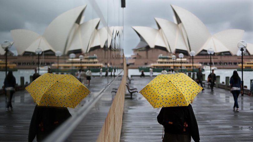 Sydney locals are being advised not to put their raincoats away just yet. Picture: NewsWire / John Appleyard