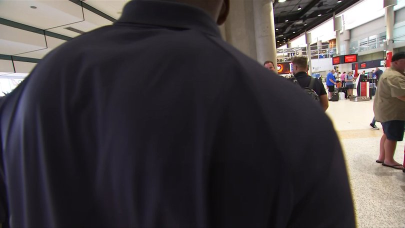 Guards got physical with camera crews at the airport.