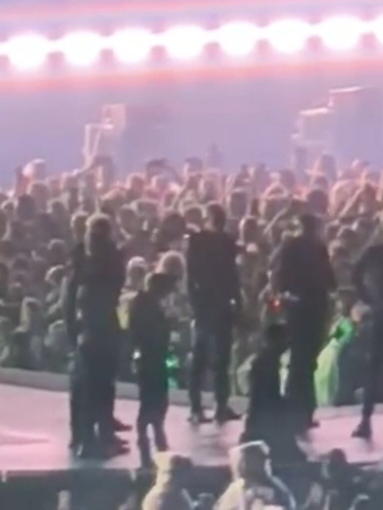 A dancer fell off the stage at Accor Stadium on Saturday.