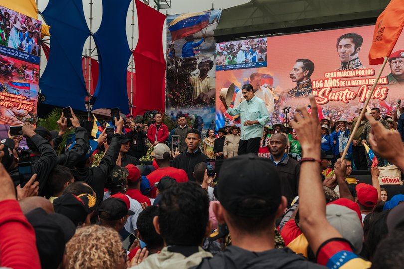 President Nicols Maduro, who increasingly relies on Cuban bodyguards for his protection, dances to the music at a rally in Caracas, Venezuela, Dec. 10, 2025.