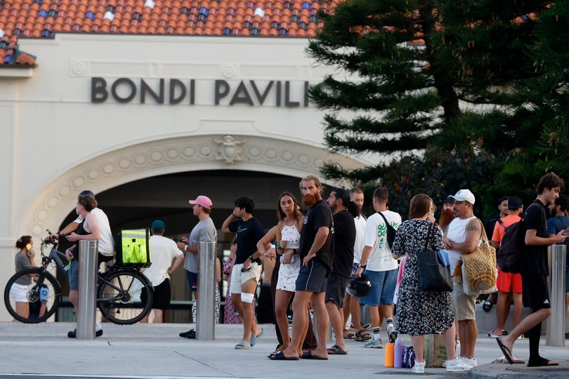 Bystanders at Bondi Beach.
