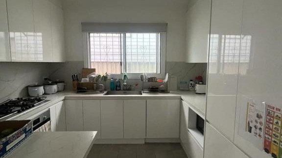 Police and forensic teams were seen swarming the house on Monday morning.