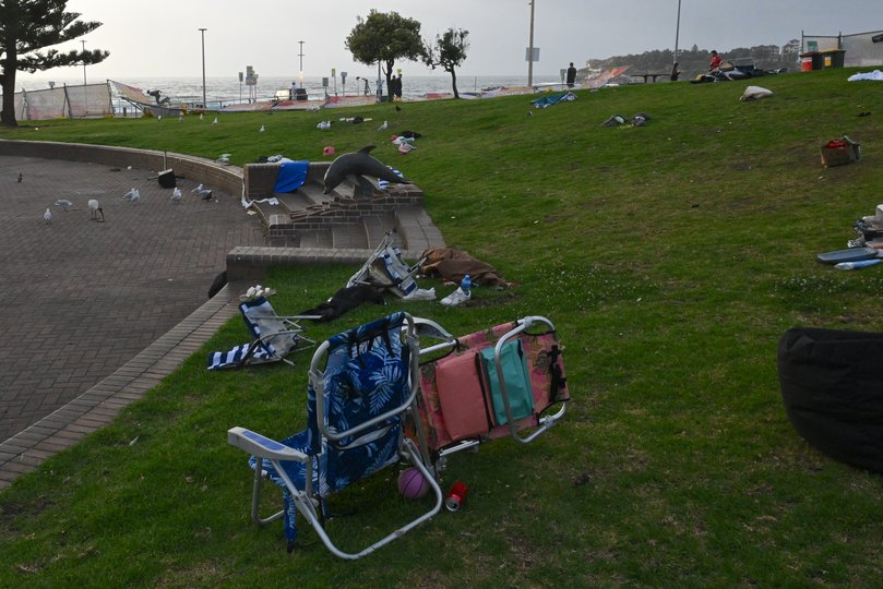 Discarded belongings at The Sunset Cinema next to the site where two gunmen opened fire at Bondi Beach in Sydney.