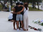 Visitors mourn in front of Bondi Pavilion at Bondi Beach.