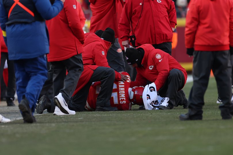 Patrick Mahomes lays on the ground after sustaining an injury during the fourth quarter against the Los Angeles Chargers.