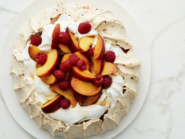 This stunning dessert is big and bold, in honour of the ballerina Anna Pavlova and the opera star Nellie Melba. Food stylist: Simon Andrews. (Ryan Liebe/The New York Times)

