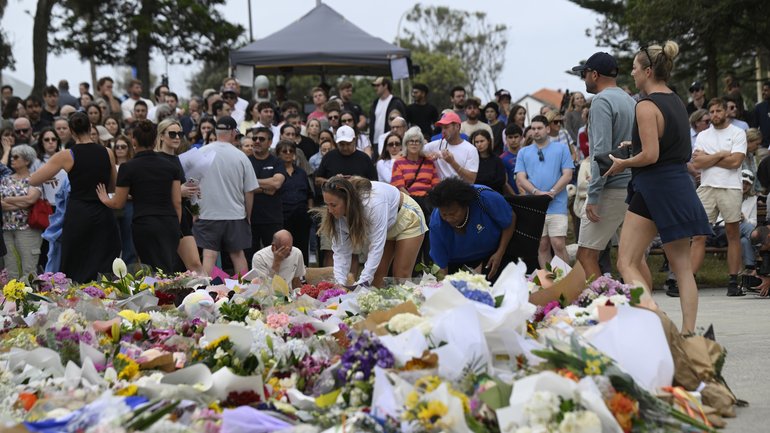 Visitors to Bondi Pavilion lay flowers on December 15, 2025.