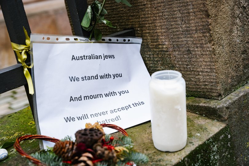 Flowers and support messages at the Copenhagen Synagogue in Denmark.