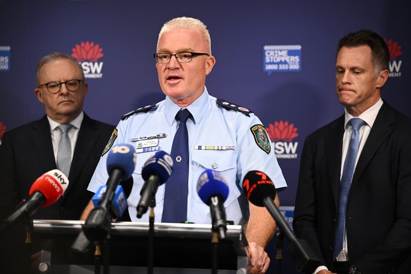 NSW Police Commissioner Mal Lanyon along with Prime Minister Anthony Albanese (left) and NSW Premier Chris Minns on Tuesday.