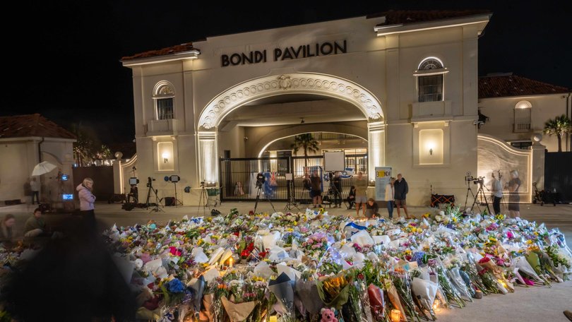 Hundreds of people laid flowers and paid tribute to the victims of the shooting. Picture: NewsWire / Monique Harmer