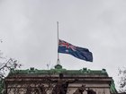 The Australian flag flies at half-mast on top of Australia House at the Australian High Commission following the terrorist attack at Bondi Beach in Sydney. (Photo by Vuk Valcic / SOPA Images/Sipa USA)