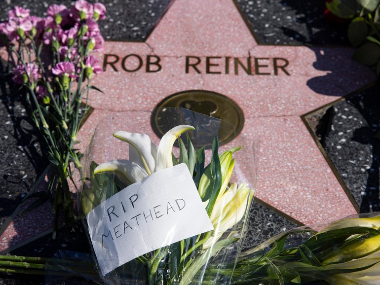 Flowers are seen placed on top of Rob Reiner's Hollywood Walk of Fame Star.
