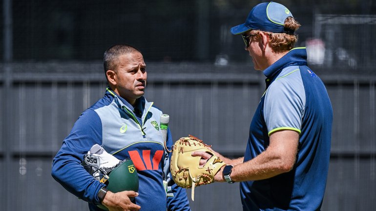 Usman Khawaja with Aussie coach Andrew McDonald on Tuesday.