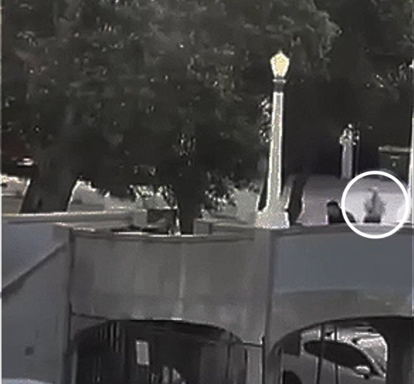 A local plain-clothes police officer is being praised for his bravery after footage emerged of him rushing to flank two armed terrorists at Bondi, appearing to take down the elder of the father and son duo from his cover behind a tree.