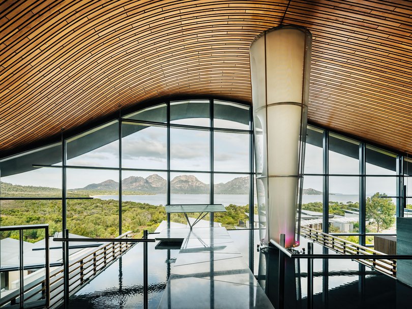 The foyer of Saffire Freycinet, capturing the magnificent views of the bay and the distant Hazards Mountains. 