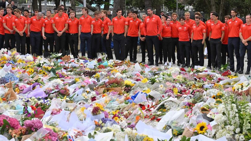 Sydney Swas players visited the Bondi Beach memorial as Pat Cummins prepared for a sombre Test. (Mick Tsikas/AAP PHOTOS)