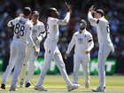 Jofra Archer of England celebrates with team mates after taking the wicket of Jake Weatherald.