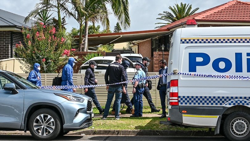 Police at Verena Akram’s home, where her husband Sajid and son Naveed lived. 