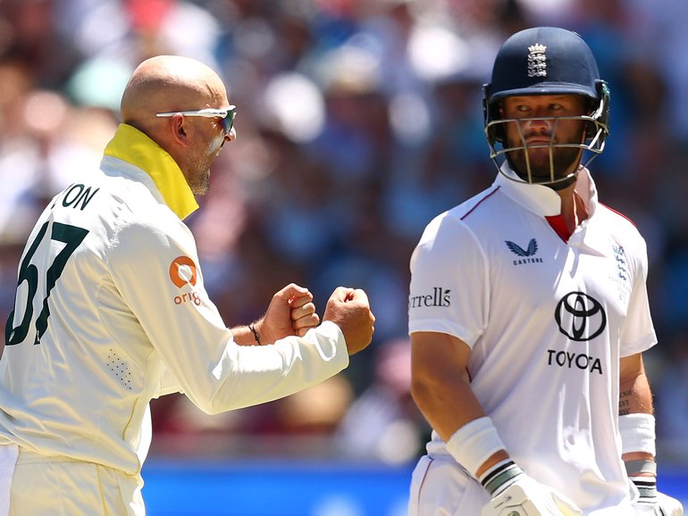Nathan Lyon celebrates the wicket of Ollie Pope.