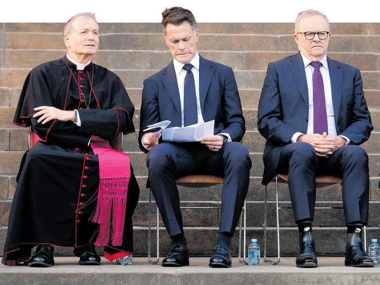 Most Rev. Anthony Fisher OP, Catholic Archbishop of Sydney, Chris Minns, Premier of New South Wales, Prime Minister Anthony Albanese and Rabbi Dr Benjamin Elton, Chief Minister of The Great Synagogue at a public memorial for the victims of the Bondi Beach terrorist attack.
