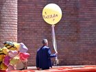 Community leader Alex Ryvchin carries a balloon at the funeral for 10-year-old Matilda. (Mick Tsikas/AAP PHOTOS)