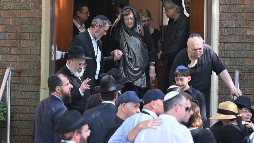Larisa Kleytman leaves the funeral her husband Alex.