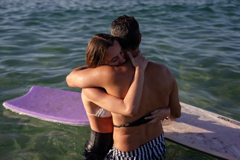 Maddy and Rani embrace.