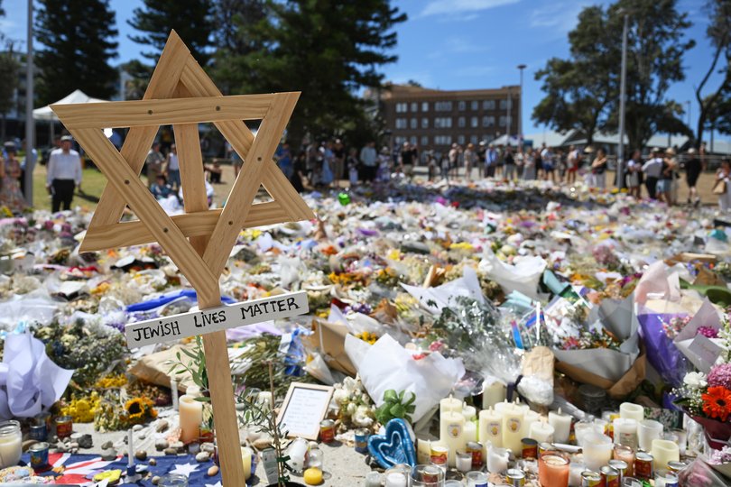 A floral tribute outside the Bondi Pavilion at Bondi Beach in Sydney, Thursday, Dec. 18, 2025. (AP Photo/Steve Markham)