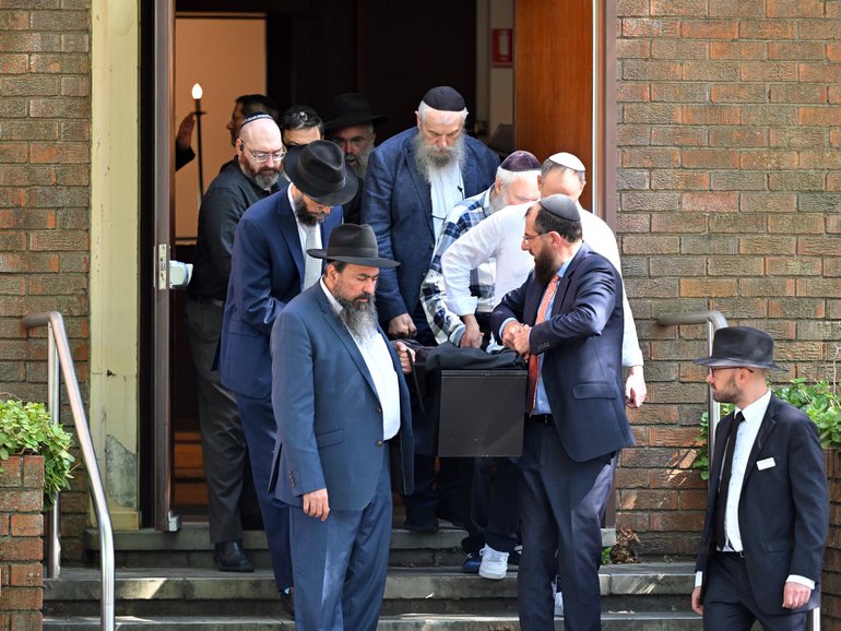 The casket is carried out during the funeral for Alex Kleytman in Sydney on Thursday.