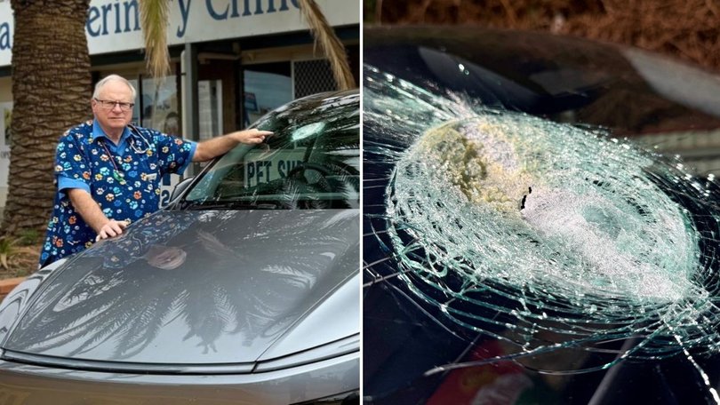 Andrew Melville-Smith and his damaged Tesla windscreen.