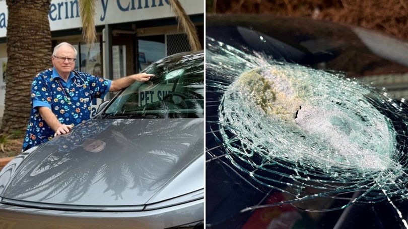 Andrew Melville-Smith and his damaged Tesla windscreen.